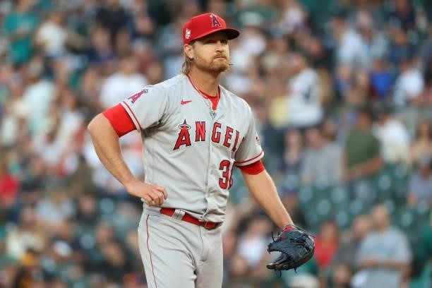Alex Cobb of the Los Angeles Angels reacts after giving up a two-run double to Shed Long Jr. #4 of the Seattle Mariners during the fourth inning at...