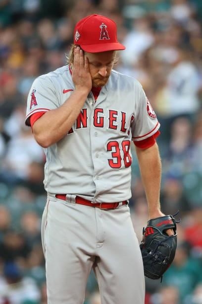 Alex Cobb of the Los Angeles Angels reacts after giving up a two-run double to Shed Long Jr. #4 of the Seattle Mariners during the fourth inning at...