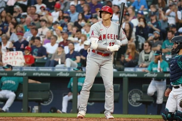 Shohei Ohtani of the Los Angeles Angels reacts while at bat during the fifth inning against the Seattle Mariners at T-Mobile Park on July 09, 2021 in...