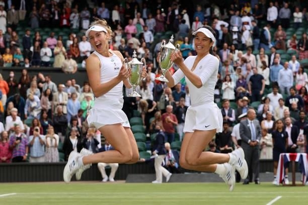 Su-Wei Hsieh of Taiwan and Elise Mertens of Belgium celebrate with their trophies after winning their Ladies' Doubles Final match against Veronika...