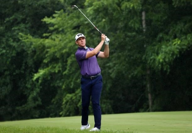 Luke List plays his second shot on the sixth hole during the third round of the John Deere Classic at TPC Deere Run on July 10, 2021 in Silvis,...