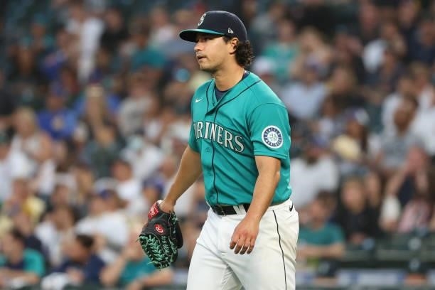 Marco Gonzales of the Seattle Mariners reacts after giving up a hit to Jose Iglesias of the Los Angeles Angels during the sixth inning at T-Mobile...