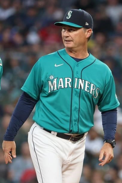 Manager Scott Servais of the Seattle Mariners looks on while making a pitching change during the sixth inning against the Los Angeles Angels at...