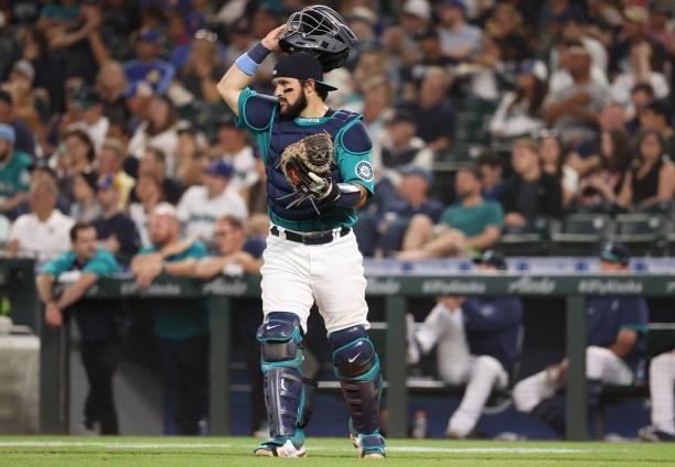 Luis Torrens of the Seattle Mariners looks on during the seventh inning against the Los Angeles Angels at T-Mobile Park on July 09, 2021 in Seattle,...
