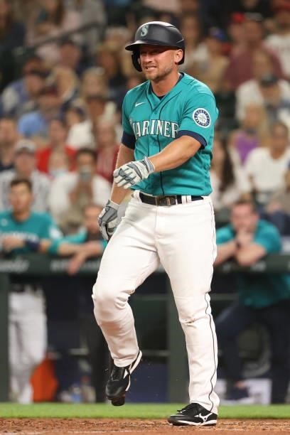 Kyle Seager of the Seattle Mariners reacts while at bat during the seventh inning against the Los Angeles Angels at T-Mobile Park on July 09, 2021 in...