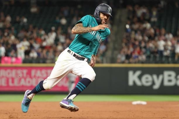 Crawford rounds the bases to score off an RBI single by Ty France of the Seattle Mariners to tie the game 3-3 during the seventh inning against the...