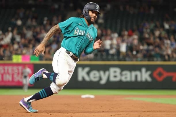 Crawford rounds the bases to score off an RBI single by Ty France of the Seattle Mariners to tie the game 3-3 during the seventh inning against the...