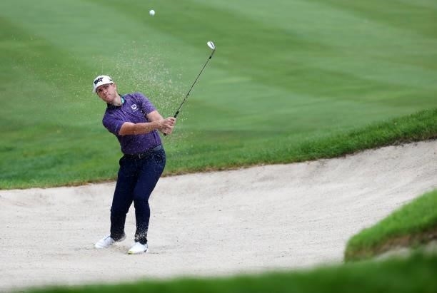 Luke List plays his third shot on the ninth hole during the third round of the John Deere Classic at TPC Deere Run on July 10, 2021 in Silvis,...
