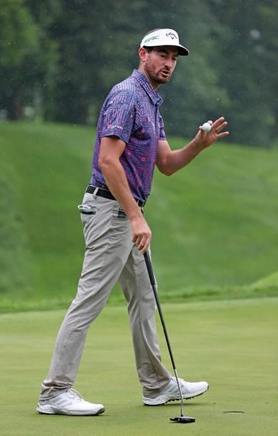 Chase Seiffert reacts to his putt on the ninth hole during the third round of the John Deere Classic at TPC Deere Run on July 10, 2021 in Silvis,...