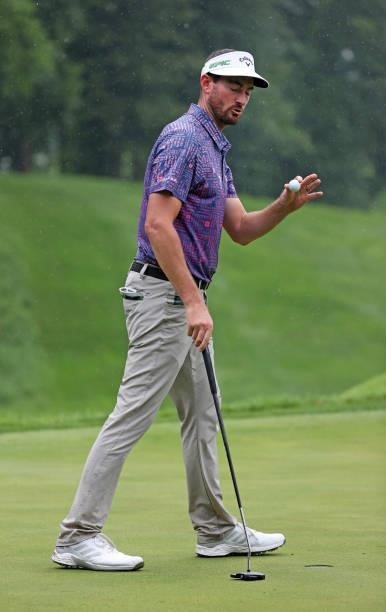 Chase Seiffert reacts to his putt on the ninth hole during the third round of the John Deere Classic at TPC Deere Run on July 10, 2021 in Silvis,...