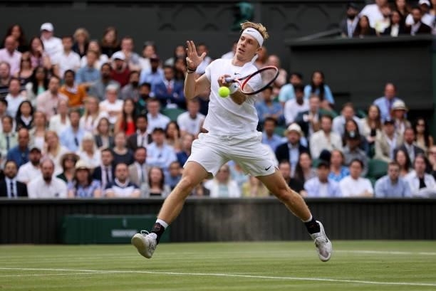 Denis Shapovalov of Canada plays a forehand volley in his Men's Singles Semi-Final match against Novak Djokovic of Serbia during Day Eleven of The...