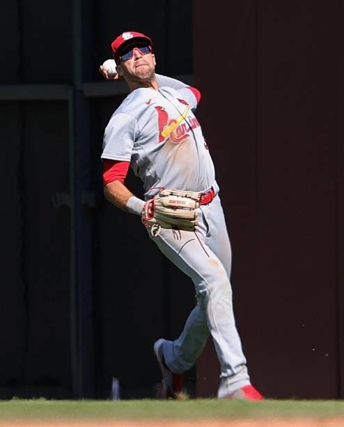 Dylan Carlson of the St. Louis Cardinals throws the ball to the infield against the Chicago Cubs at Wrigley Field on July 09, 2021 in Chicago,...