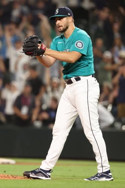 Kendall Graveman of the Seattle Mariners celebrates after forcing the final out to defeat the Los Angeles Angels 7-3 at T-Mobile Park on July 09,...