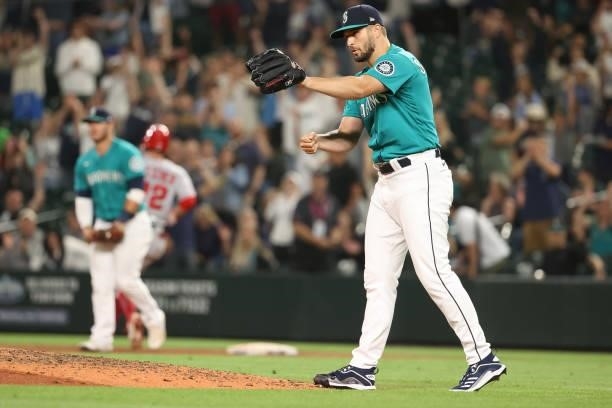 Kendall Graveman of the Seattle Mariners celebrates after forcing the final out to defeat the Los Angeles Angels 7-3 at T-Mobile Park on July 09,...