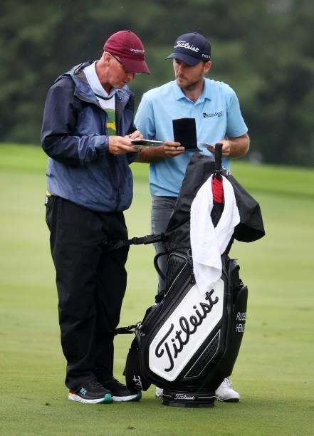 Russell Henley prepares to play his third shot on the 15th hole during the third round of the John Deere Classic at TPC Deere Run on July 10, 2021 in...