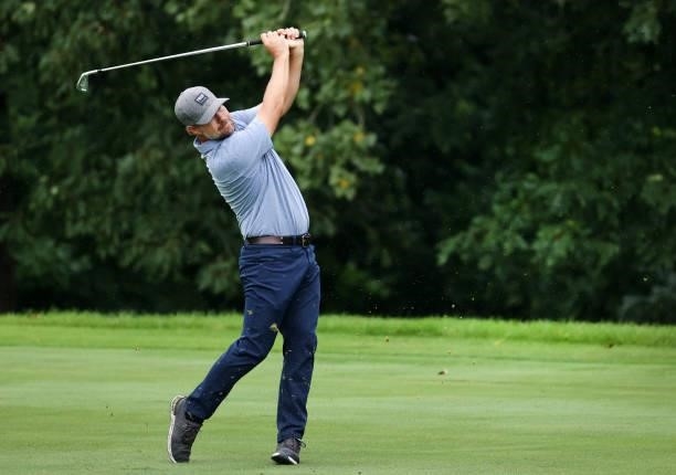 Ryan Moore plays his second shot on the 15th hole during the third round of the John Deere Classic at TPC Deere Run on July 10, 2021 in Silvis,...