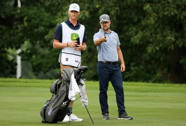 Ryan Moore prepares to play his second shot on the 15th hole during the third round of the John Deere Classic at TPC Deere Run on July 10, 2021 in...