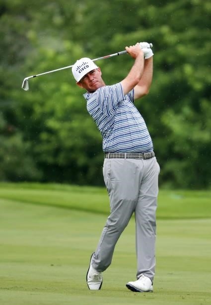 Chez Reavie plays his second shot on the 15th hole during the third round of the John Deere Classic at TPC Deere Run on July 10, 2021 in Silvis,...
