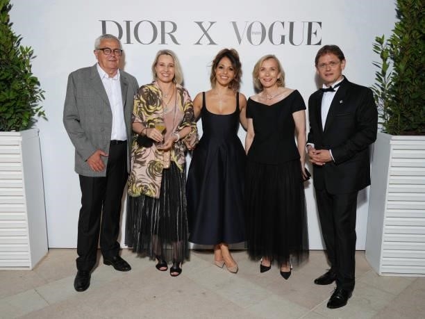 François Demachy and his wife, and Laurent Kleitman attend the Dior dinner during the 74th annual Cannes Film Festival on July 10, 2021 in Cannes,...