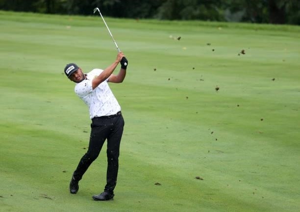 Sebastian Munoz of Colombia plays his second shot on the 15th hole during the third round of the John Deere Classic at TPC Deere Run on July 10, 2021...