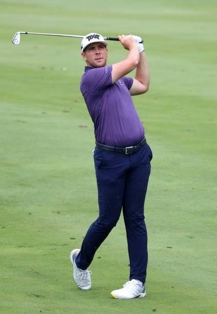 Luke List plays his second shot on the 15th hole during the third round of the John Deere Classic at TPC Deere Run on July 10, 2021 in Silvis,...