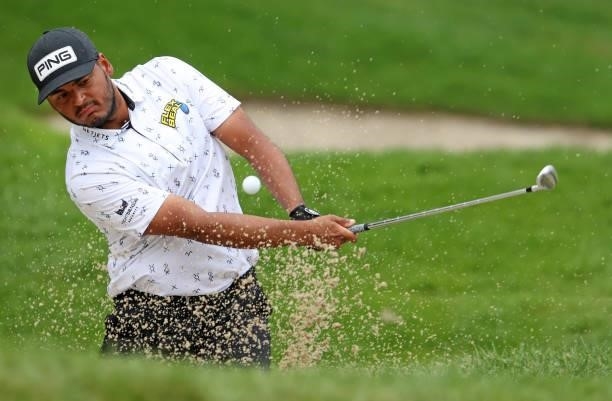 Sebastian Munoz of Colombia plays a shot from a bunker on the 15th hole during the third round of the John Deere Classic at TPC Deere Run on July 10,...