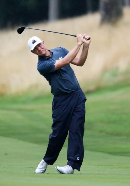 Lucas Glover plays his second shot on the 17th hole during the third round of the John Deere Classic at TPC Deere Run on July 10, 2021 in Silvis,...