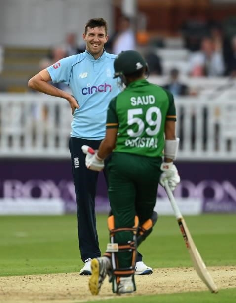 Craig Overton of England smiles at Saud Shakeel of Pakistan during the second One Day International between England and Pakistan at Lord's Cricket...