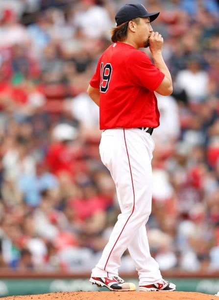 Hirokazu Sawamura of the Boston Red Sox prepares to throw against the Philadelphia Phillies during the fourth inning at Fenway Park on July 10, 2021...