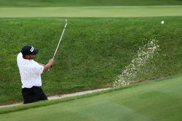 Sebastian Munoz of Colombia plays a shot from a bunker on the 16th hole during the third round of the John Deere Classic at TPC Deere Run on July 10,...