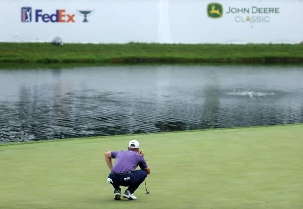 Luke List lines up a putt on the 18th green during the third round of the John Deere Classic at TPC Deere Run on July 10, 2021 in Silvis, Illinois.