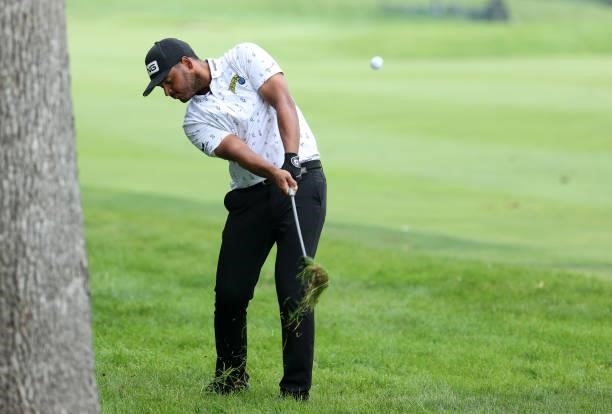 Sebastian Munoz of Colombia plays his second shot on the 18th green during the third round of the John Deere Classic at TPC Deere Run on July 10,...