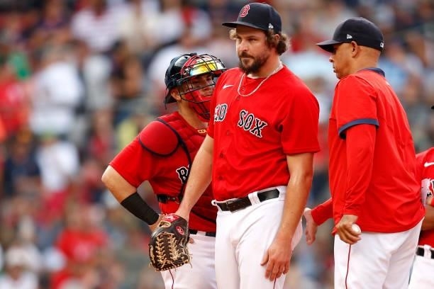 Josh Taylor of the Boston Red Sox is relieved after allowing two runs during the eighth against the Philadelphia Phillies inning at Fenway Park on...