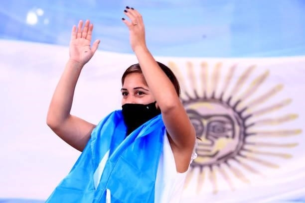 Fan of Argentina cheers with a flag in the stands prior to the final of Copa America Brazil 2021 between Brazil and Argentina at Maracana Stadium on...