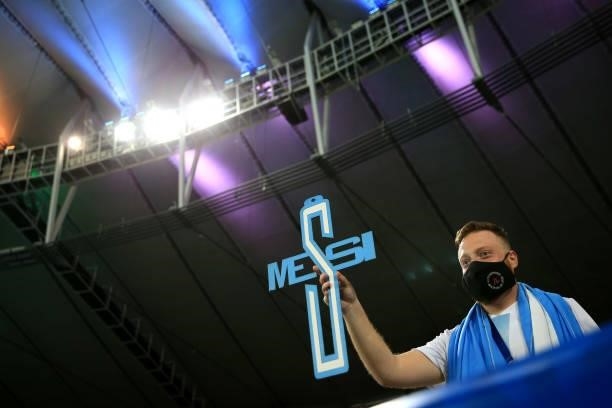 Fan of Argentina holds a sign that reads Messi in the stands prior to the final of Copa America Brazil 2021 between Brazil and Argentina at Maracana...