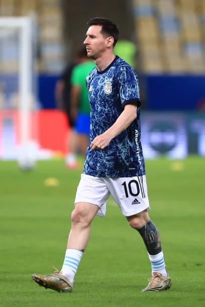 Lionel Messi of Argentina warms up prior to the final of Copa America Brazil 2021 between Brazil and Argentina at Maracana Stadium on July 10, 2021...