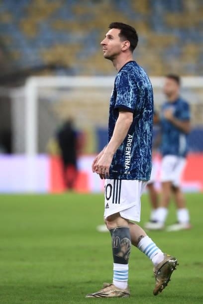 Lionel Messi of Argentina warms up prior to the final of Copa America Brazil 2021 between Brazil and Argentina at Maracana Stadium on July 10, 2021...