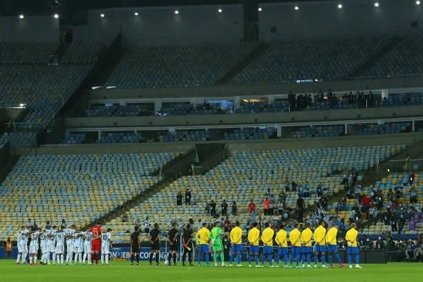 Players of Argentina and Brazil stand for the national anthems prior to the final of Copa America Brazil 2021 between Brazil and Argentina at...