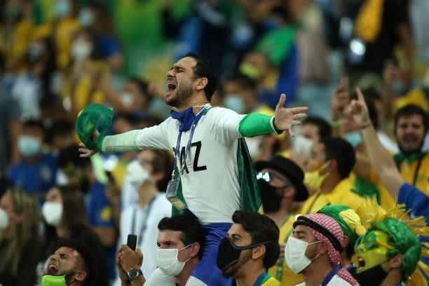 Fans of Brazil chant prior to the final of Copa America Brazil 2021 between Brazil and Argentina at Maracana Stadium on July 10, 2021 in Rio de...