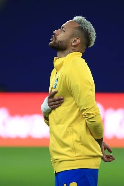 Neymar Jr. Of Brazil sings the national anthem prior to the final of Copa America Brazil 2021 between Brazil and Argentina at Maracana Stadium on...