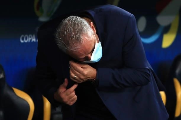 Tite head coach of Brazil takes off his facemask prior to the final of Copa America Brazil 2021 between Brazil and Argentina at Maracana Stadium on...