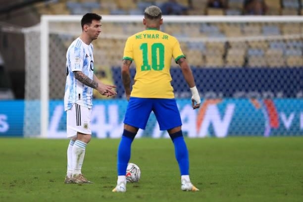 Lionel Messi of Argentina reacts with Neymar Jr. Of Brazil during the final of Copa America Brazil 2021 between Brazil and Argentina at Maracana...