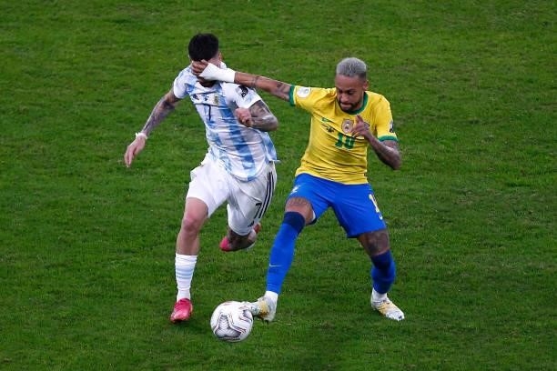 Neymar Jr. Of Brazil fights for the ball with Rodrigo De Paul of Argentina during the final of Copa America Brazil 2021 between Brazil and Argentina...