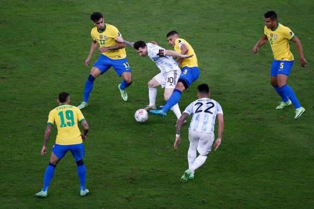 Lionel Messi of Argentina fights for the ball with Thiago Silva of Brazil during the final of Copa America Brazil 2021 between Brazil and Argentina...