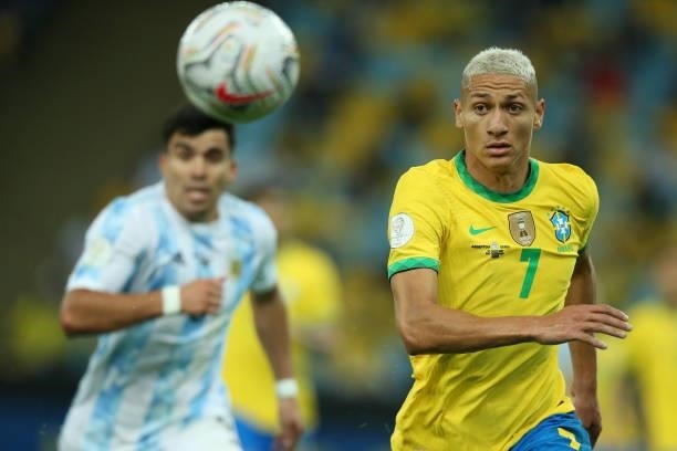 Richarlison of Brazil runs after the ball during the final of Copa America Brazil 2021 between Brazil and Argentina at Maracana Stadium on July 10,...