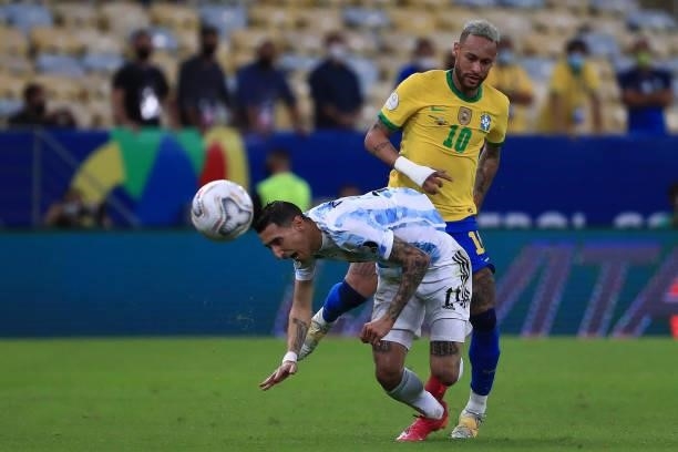 Angel Di Maria of Argentina fights for the ball with Neymar Jr. Of Brazil during the final of Copa America Brazil 2021 between Brazil and Argentina...