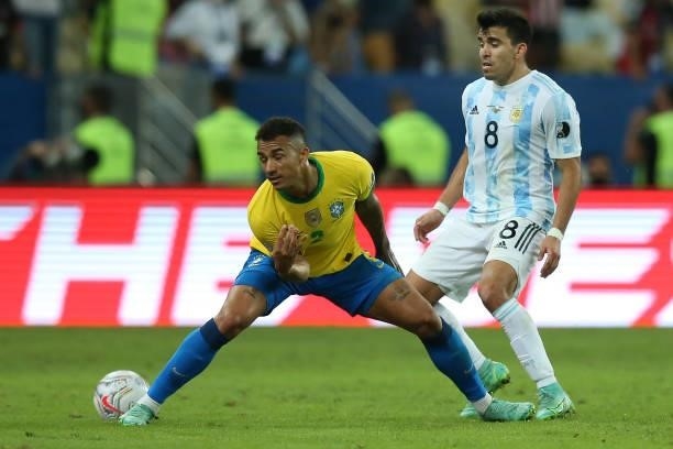 Danilo da Silva of Brazilfights for the ball with Marcos Acuña of Argentina during the final of Copa America Brazil 2021 between Brazil and Argentina...