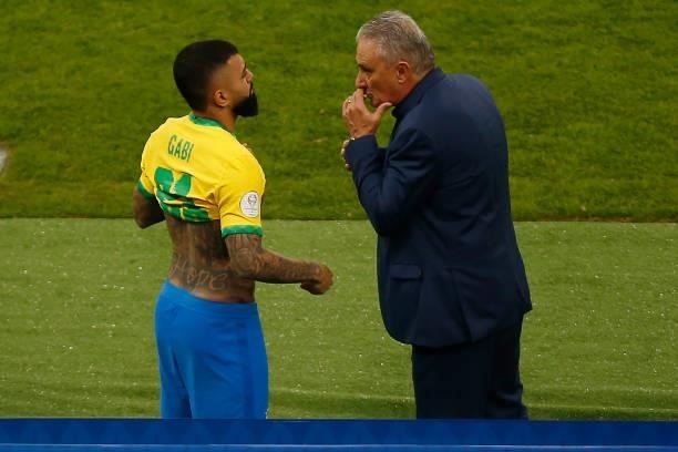 Tite head coach of Brazil talks to Gabriel Barbosa of Brazil during the final of Copa America Brazil 2021 between Brazil and Argentina at Maracana...
