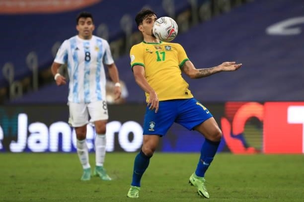 Lucas Paqueta of Brazil chests the ball during the final of Copa America Brazil 2021 between Brazil and Argentina at Maracana Stadium on July 10,...