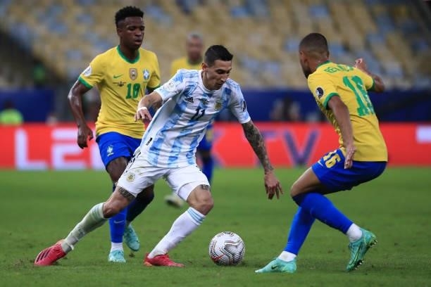 Angel Di Maria of Argentina fights for the ball with Renan Lodi of Brazil during the final of Copa America Brazil 2021 between Brazil and Argentina...